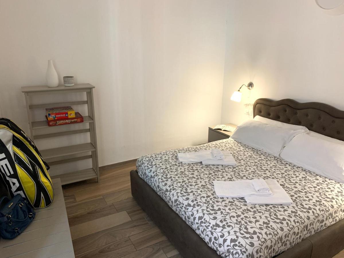 Camera Quadrupla Superior