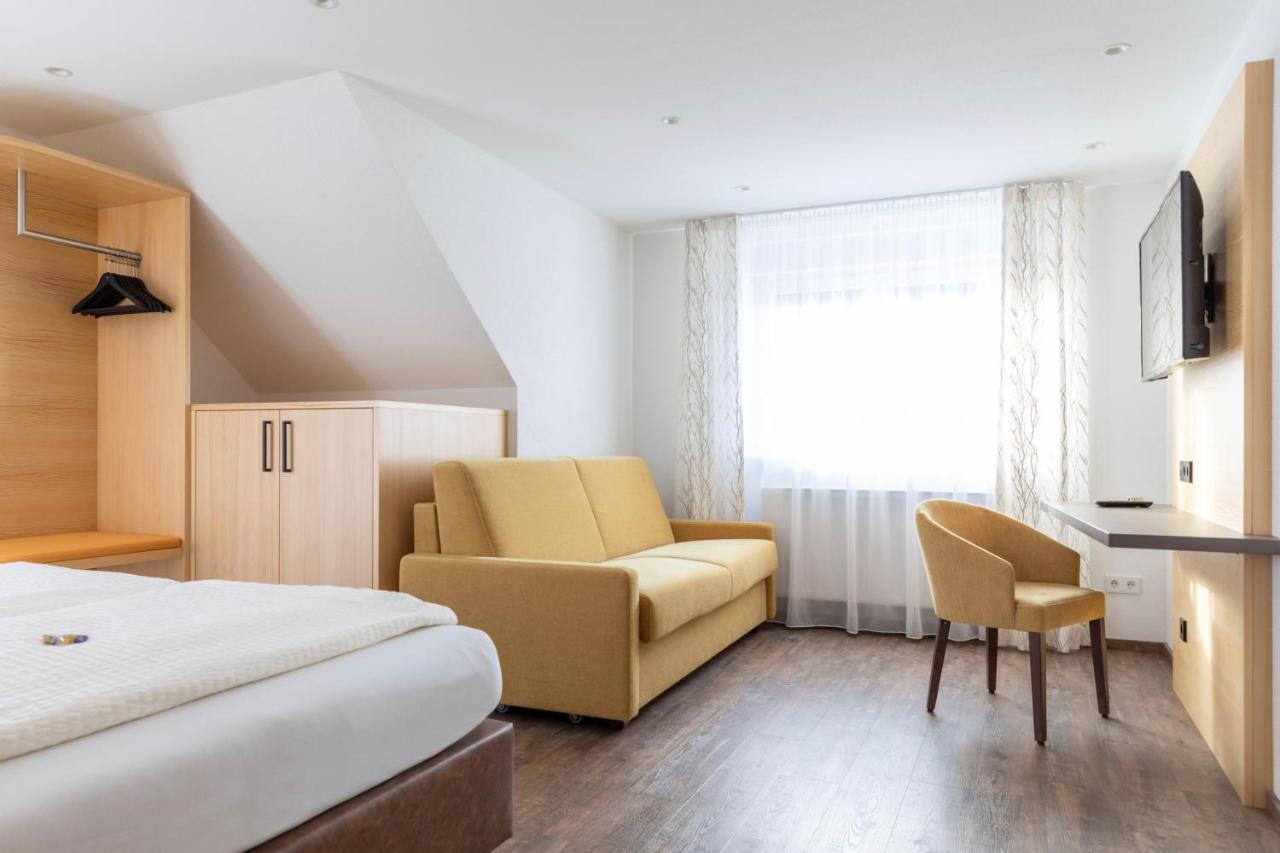 Deluxe Doppelzimmer mit Schlafsofa und Balkon
