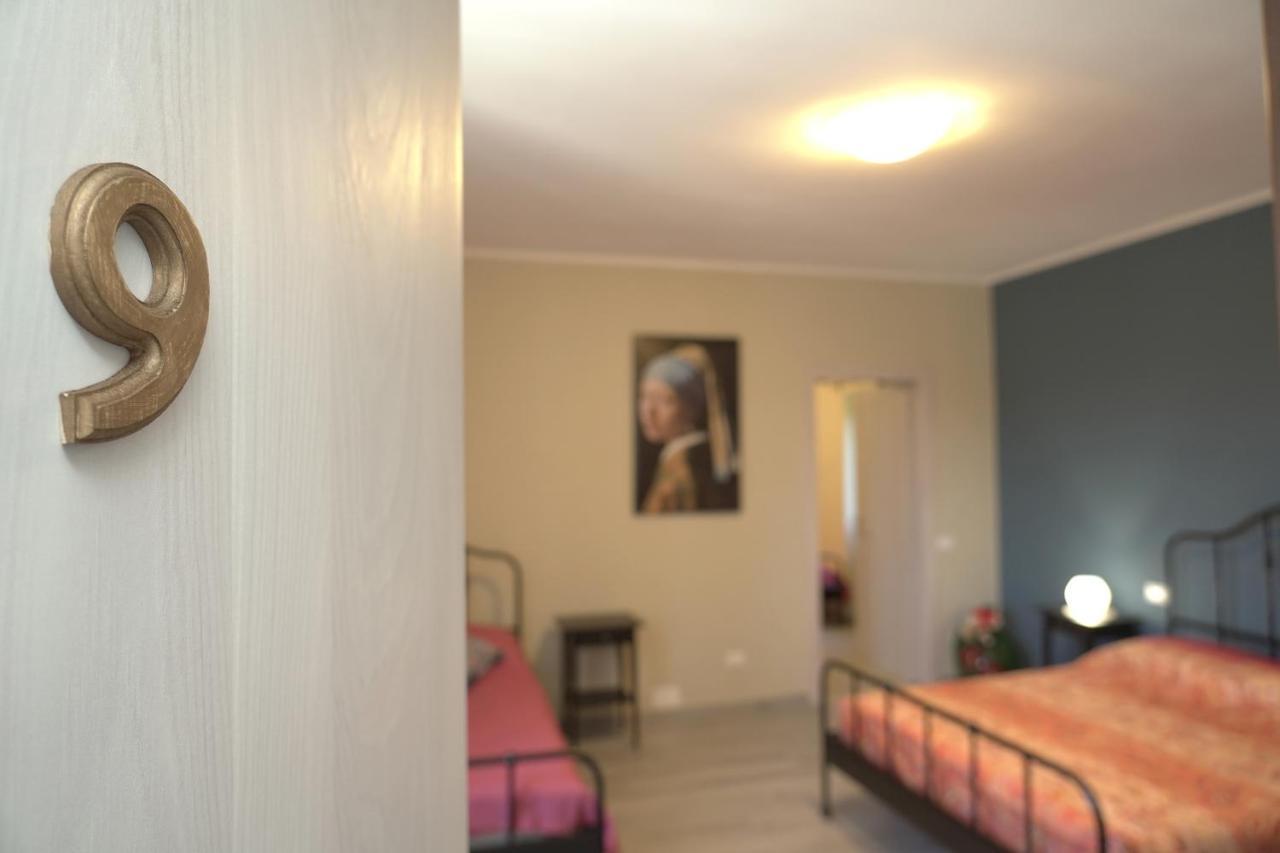 Camera Familiare con Bagno in Comune