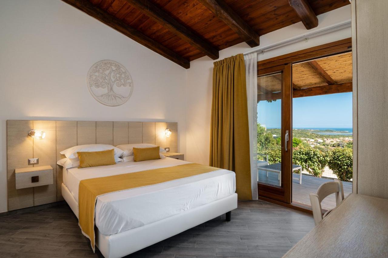 Kamer met Queensize Bed en Uitzicht op Zee