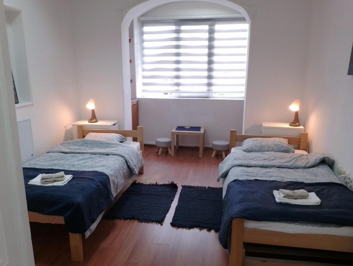 Tweepersoonskamer met 2 Aparte Bedden