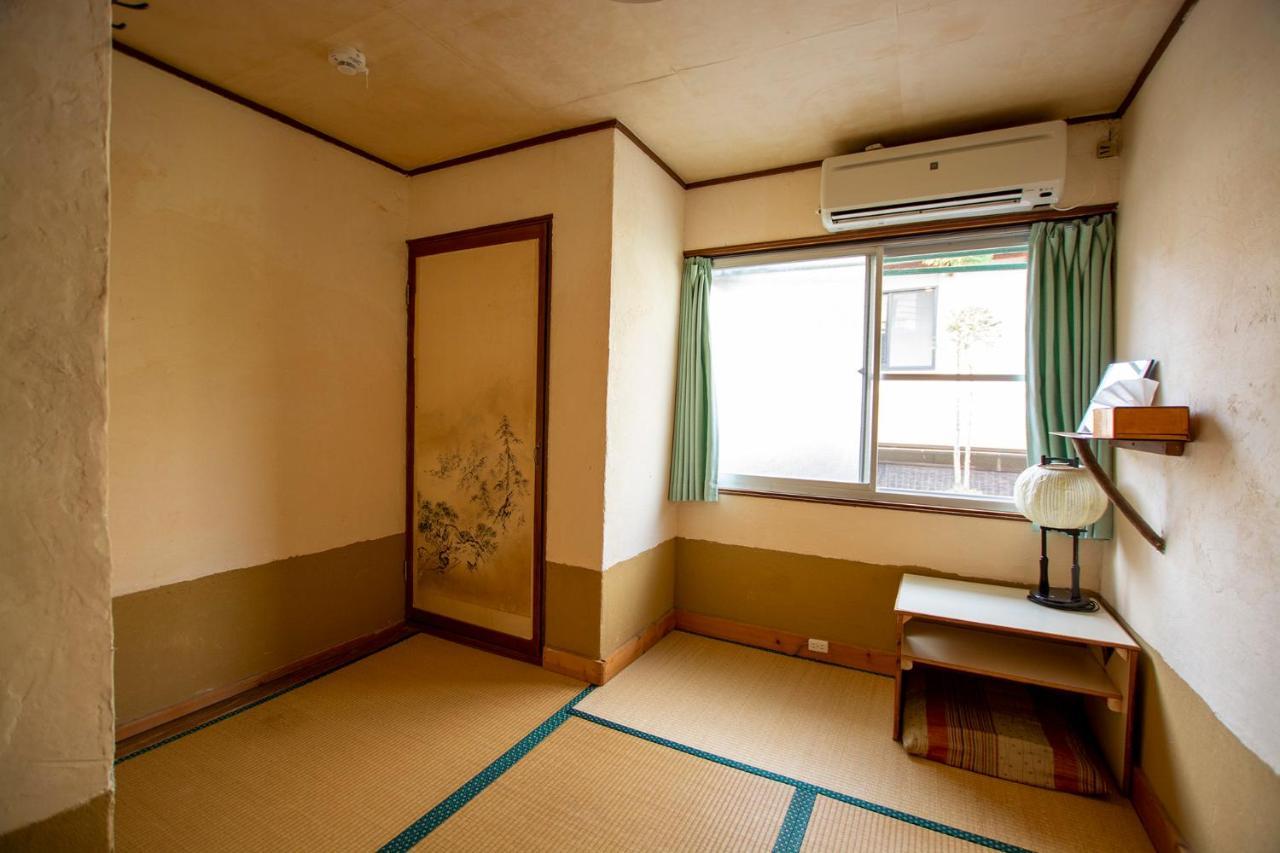 Single Room with Shared Shower and Toilet