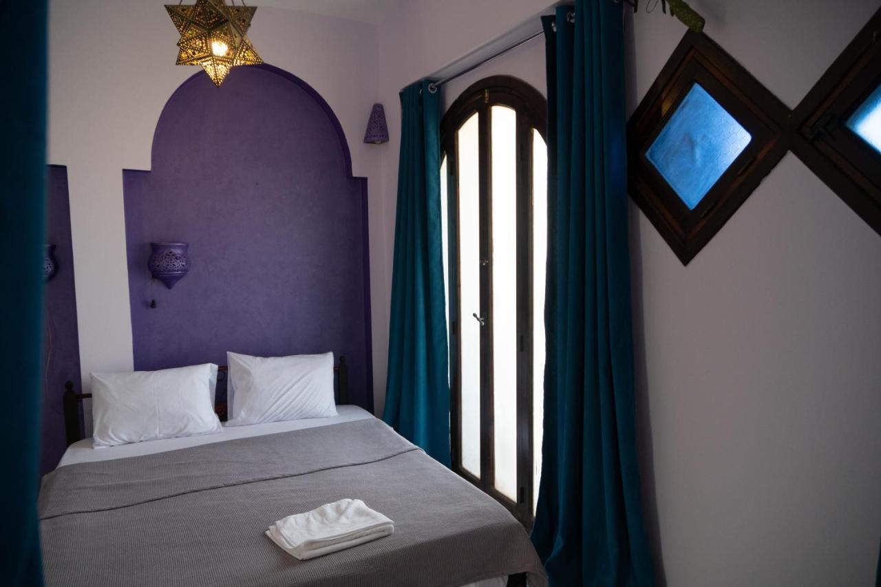 Dreibettzimmer mit Bergblick