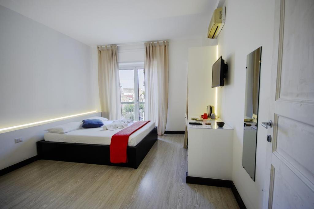 Habitación Doble con balcón (3 adultos)