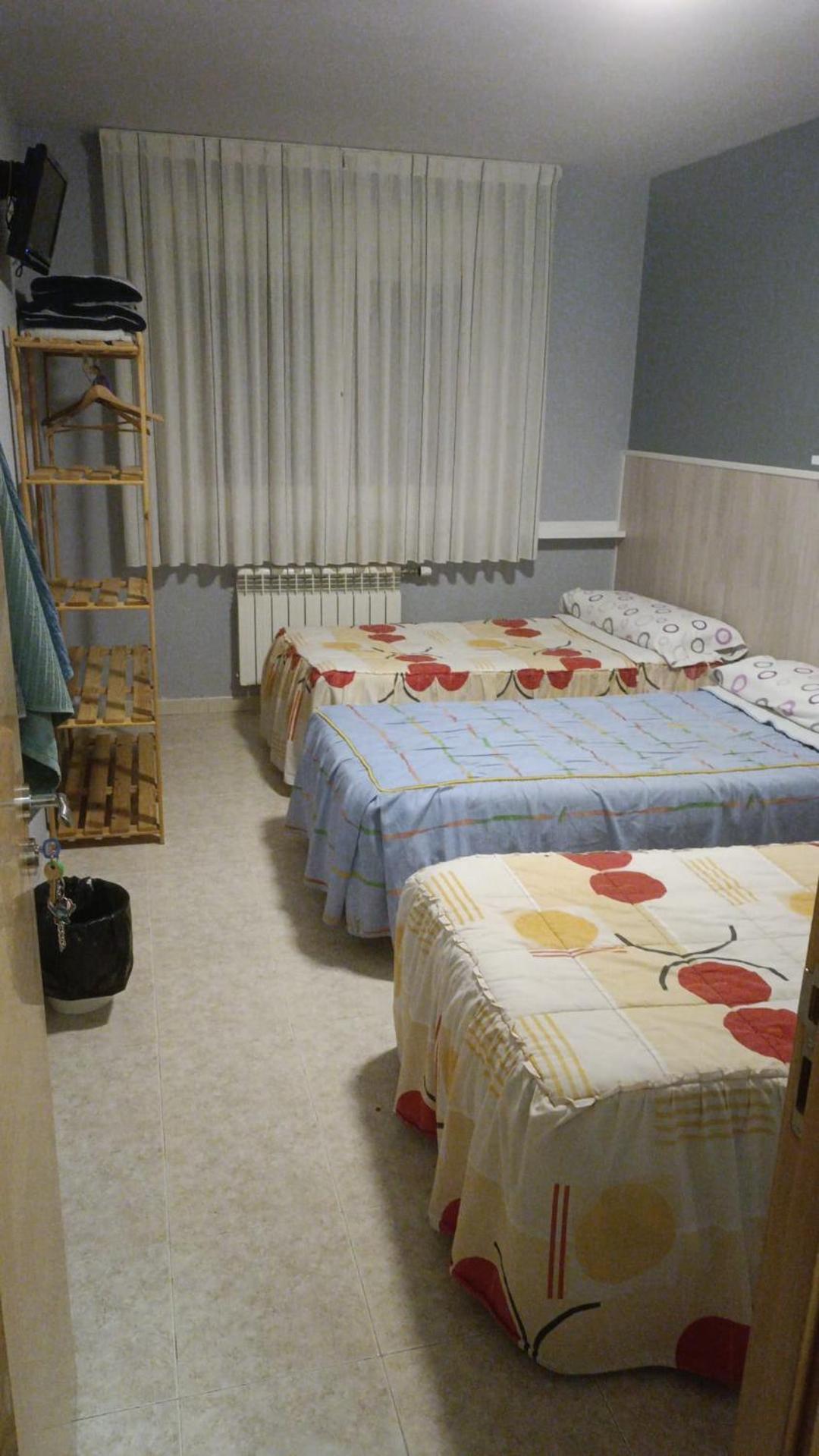 Habitación Triple Básica con baño compartido