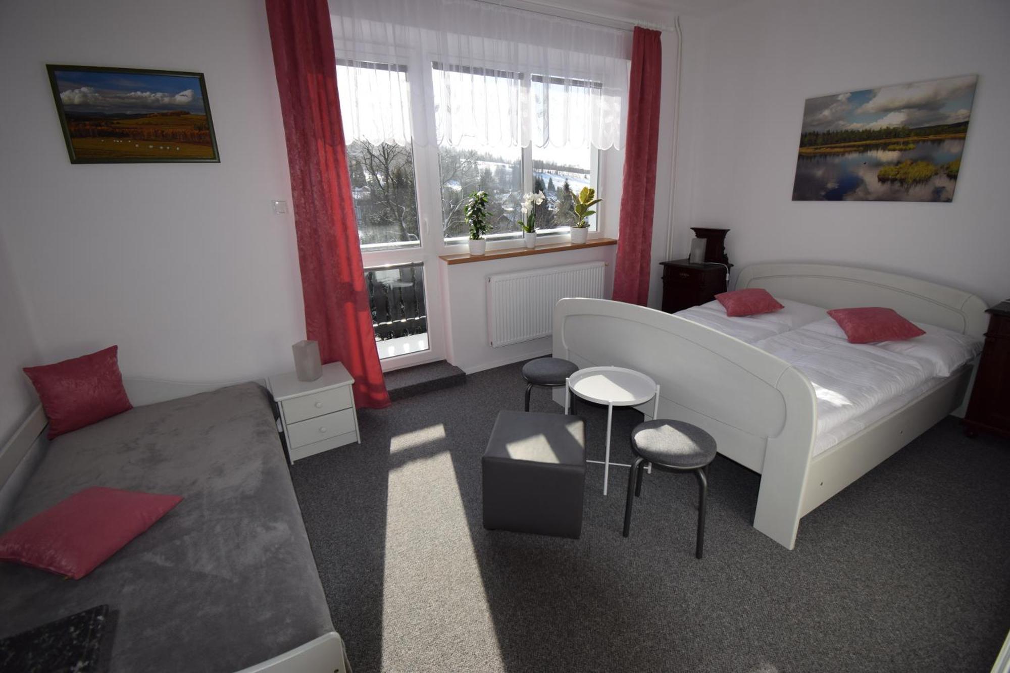 Vierbettzimmer mit Balkon