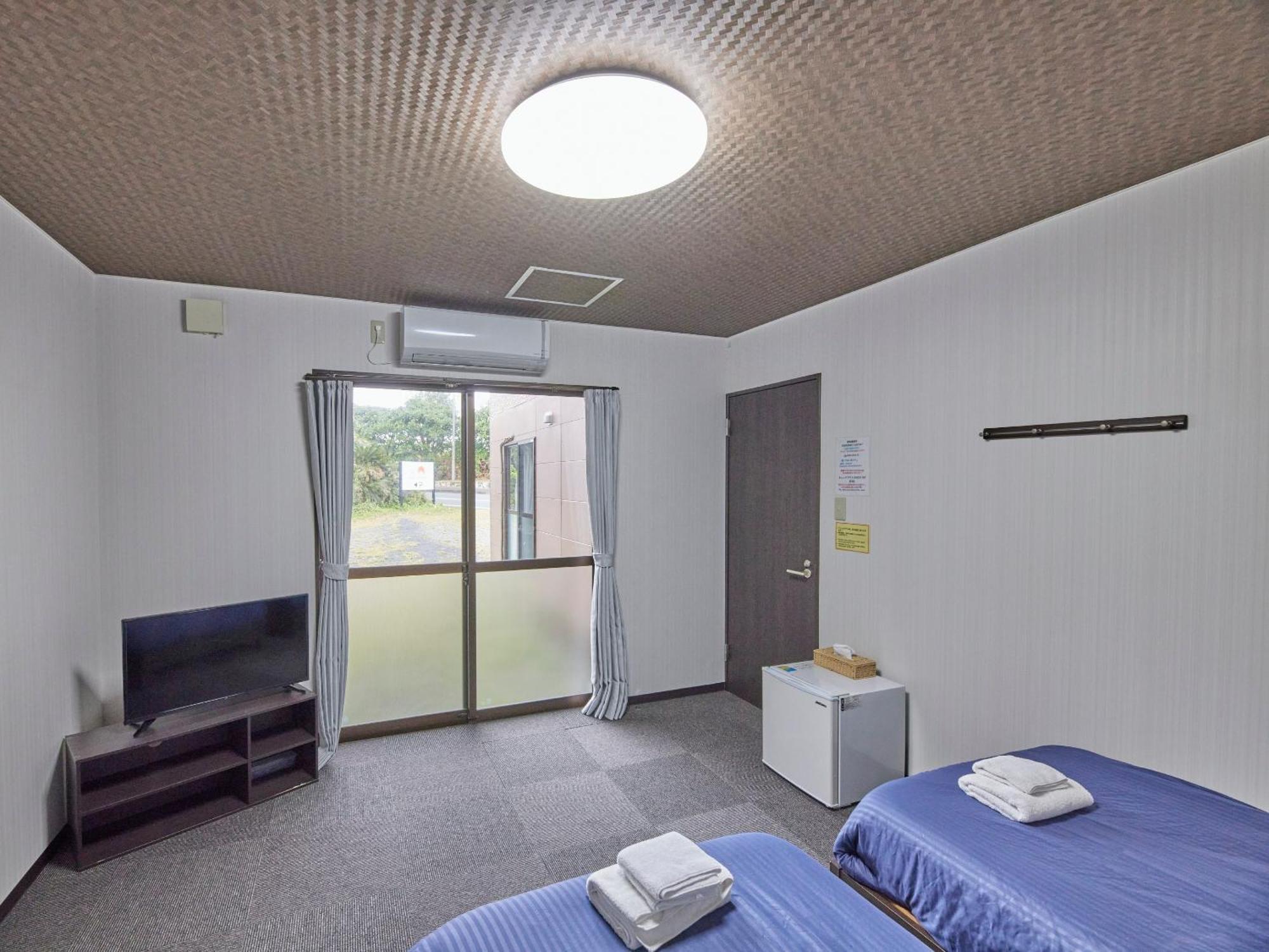 Triple Room with Shared Bathroom