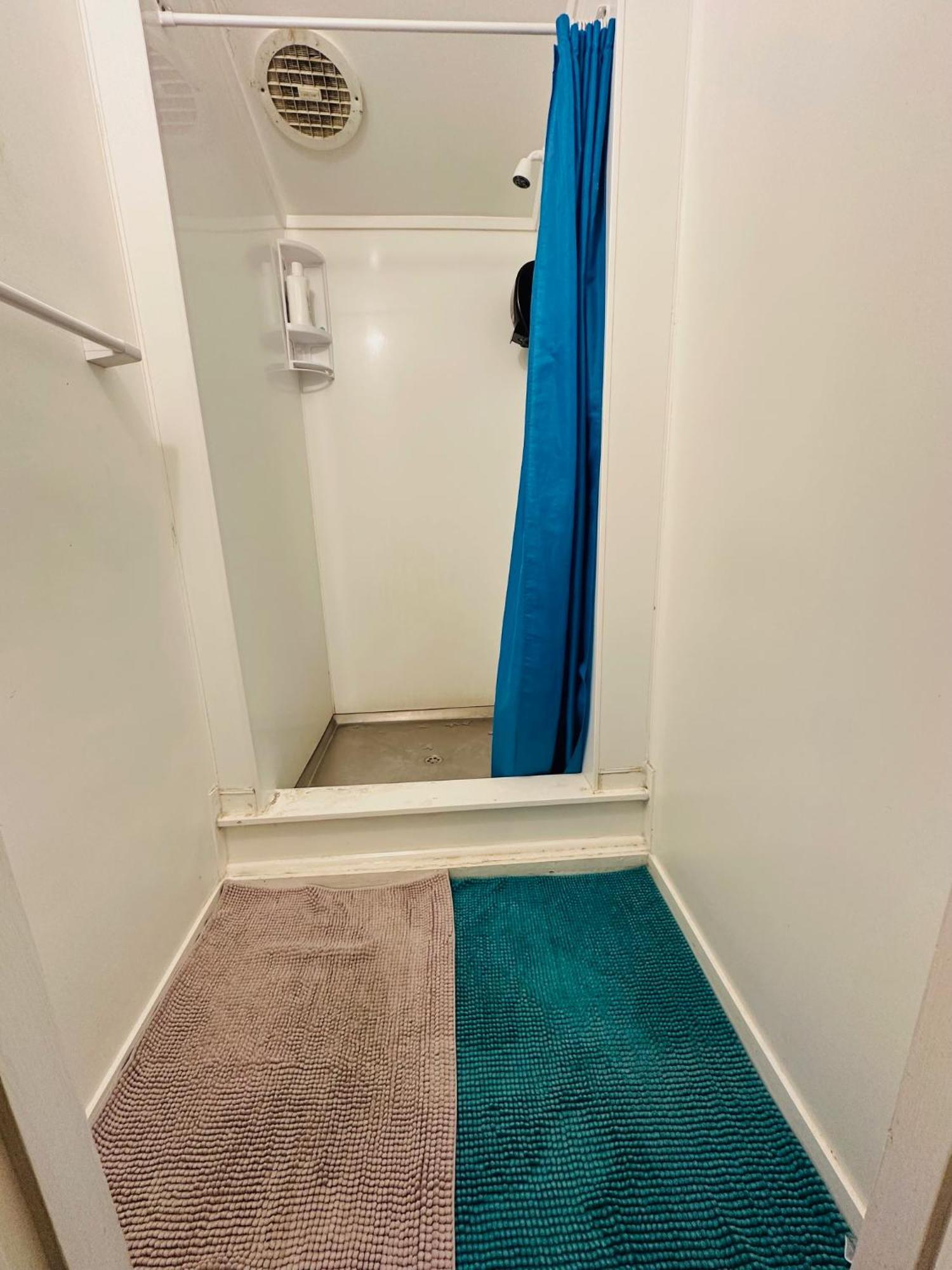 Single Room Shared Shower Toilet