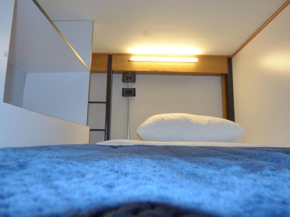 Cama Individual en dormitorio compartido de 6 camas