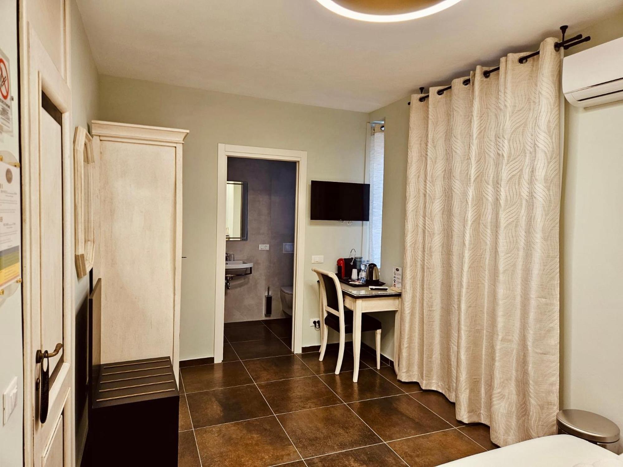 Camera Matrimoniale/Doppia con Letti Singoli con Bagno Privato