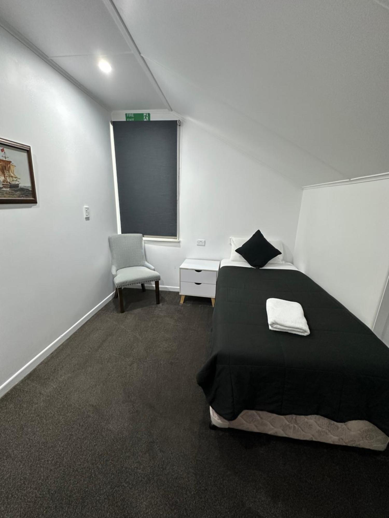 Single Room Shared Shower Toilet