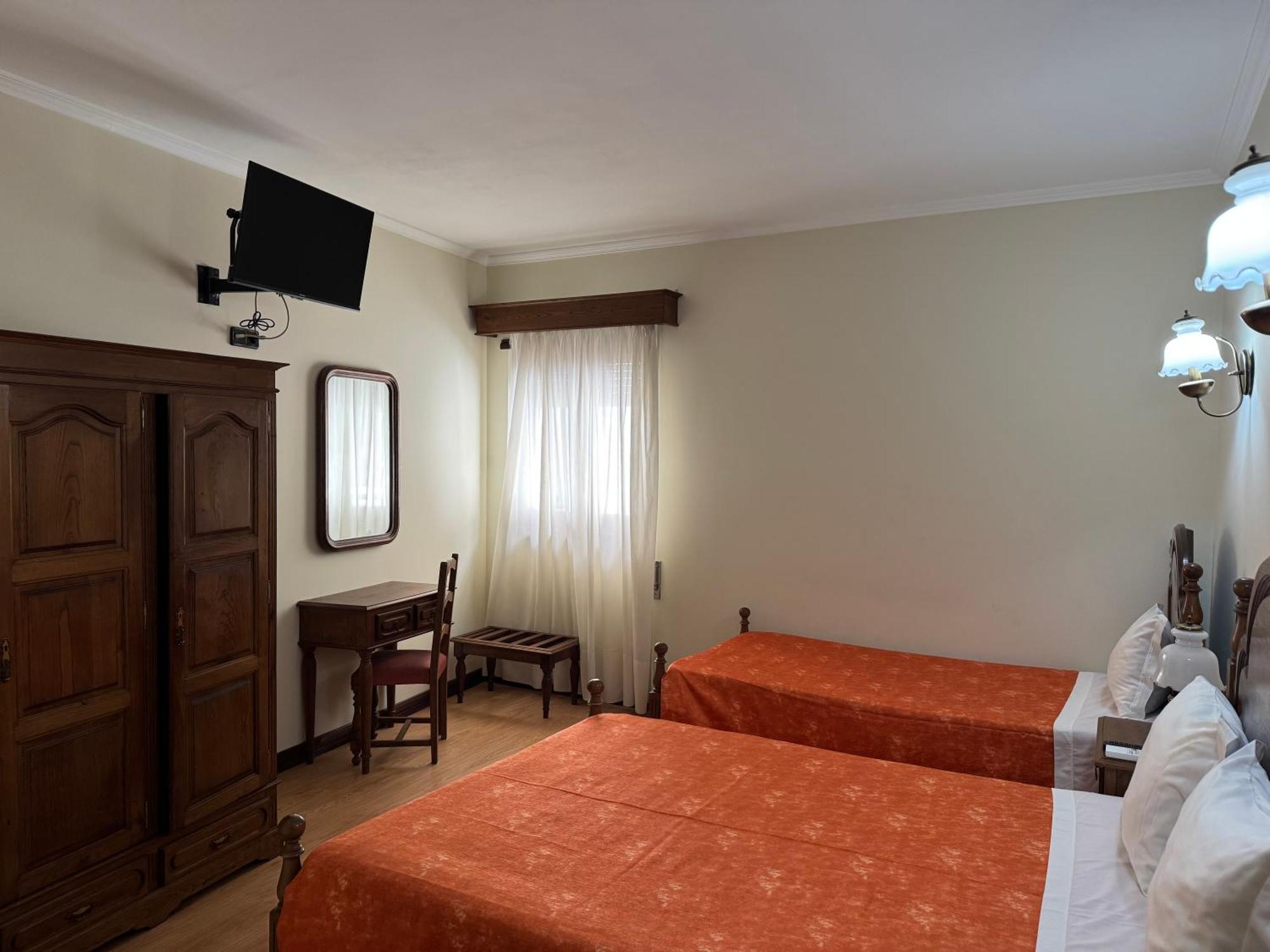 Quarto Duplo com Cama Extra