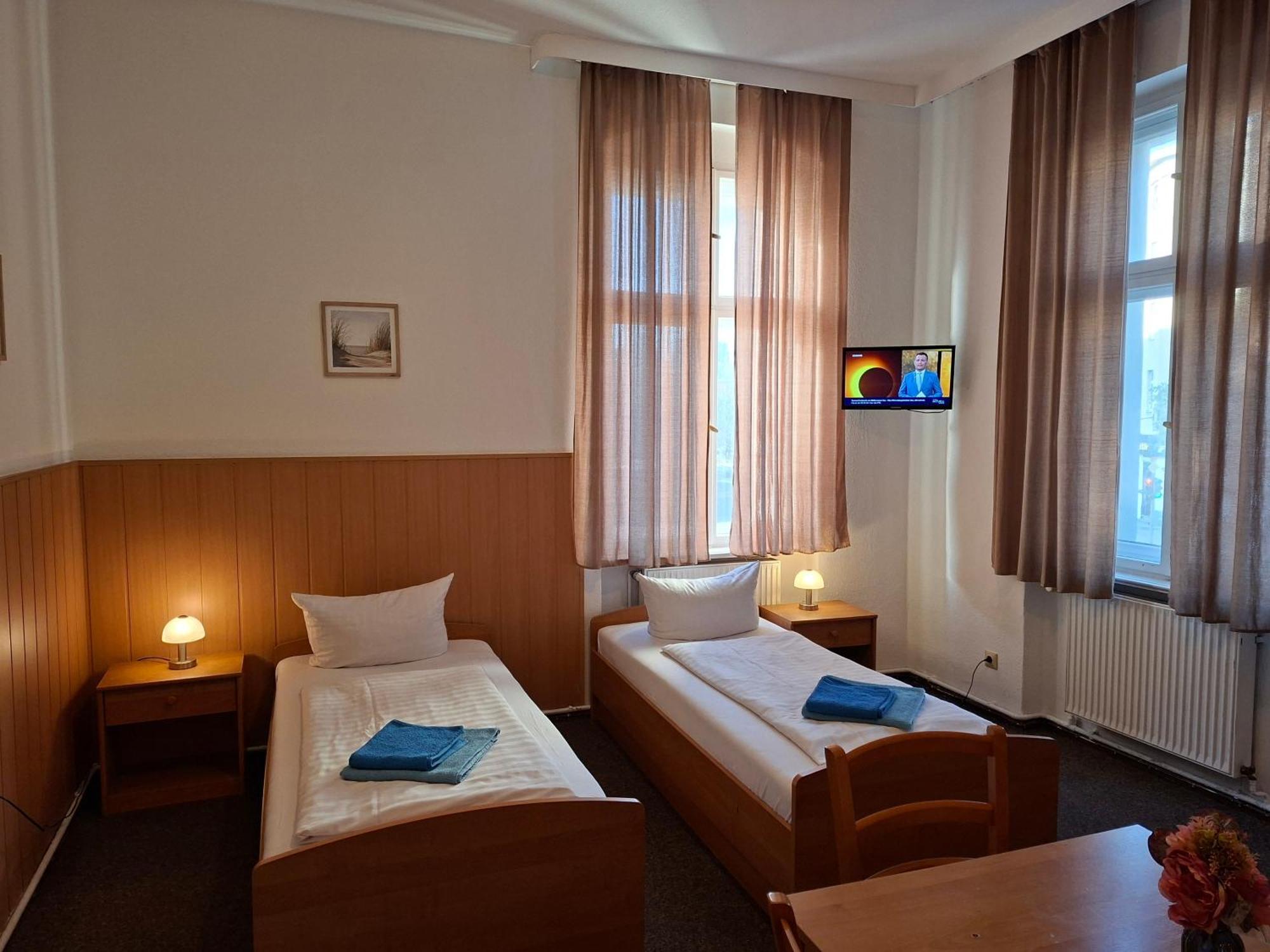 Dreibettzimmer mit Gemeinschaftsbad