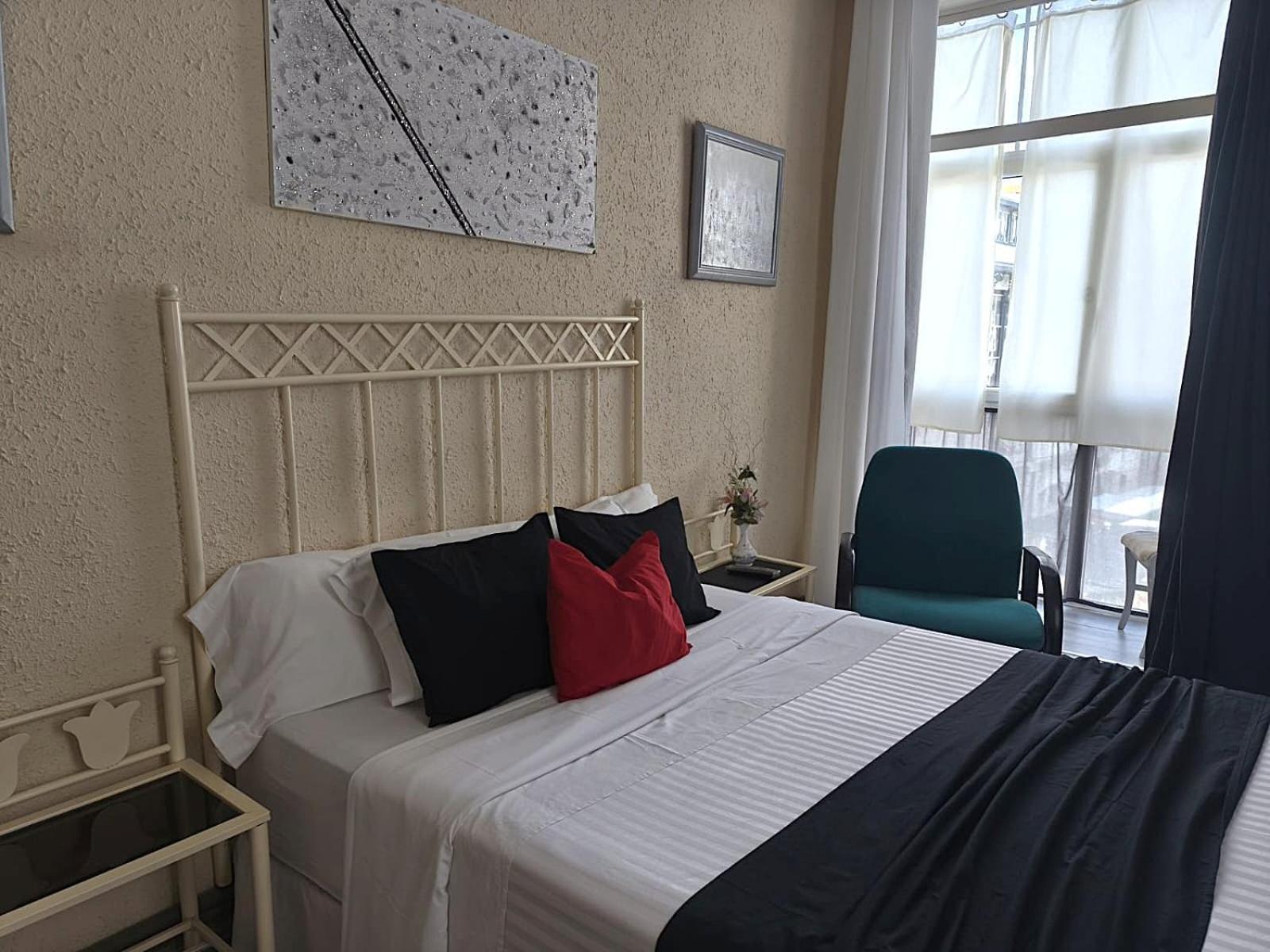 Habitación Doble con ducha y baño compartido