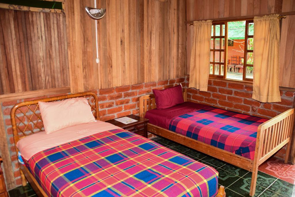 Habitación Familiar con vistas al jardín