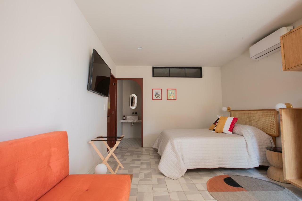 Habitación Triple con vistas al jardín