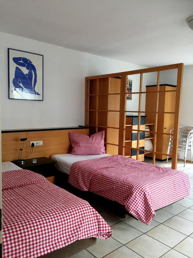 Dreibettzimmer mit Balkon