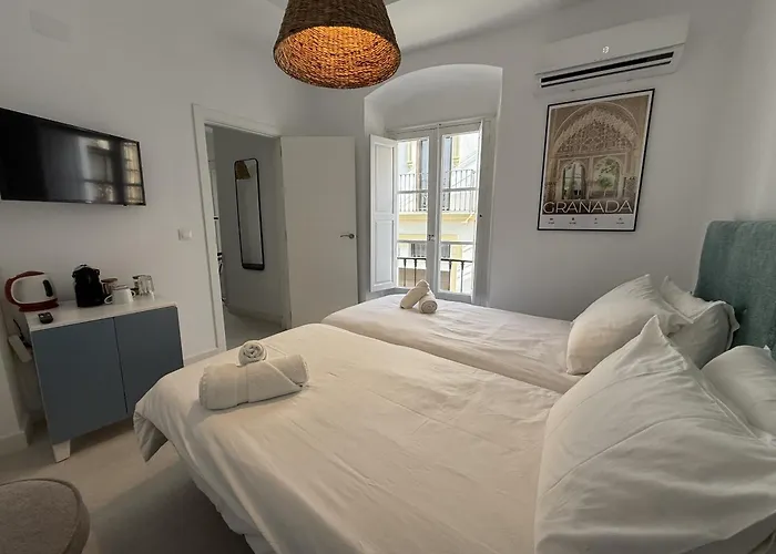 Casa Cristóbal Colón habitaciones con vistas a Semana Santa y Fiestas Ayamonte